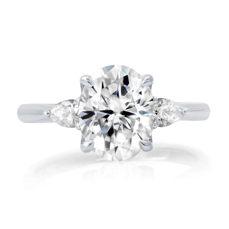Petal Inspired Three Stone Engagement Ring Setting with Matching Pear Shape Diamonds