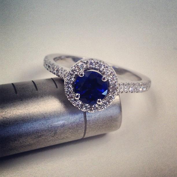 Pave Accented Blue Sapphire Halo Sapphire Engagement Rings deBebians 