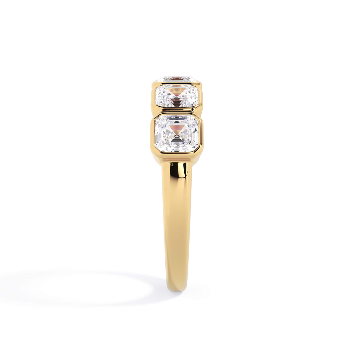 A picture of a five stone diamond wedding ring with asscher shape diamonds that are bezel set in yellow gold on a white background with a side profile view.