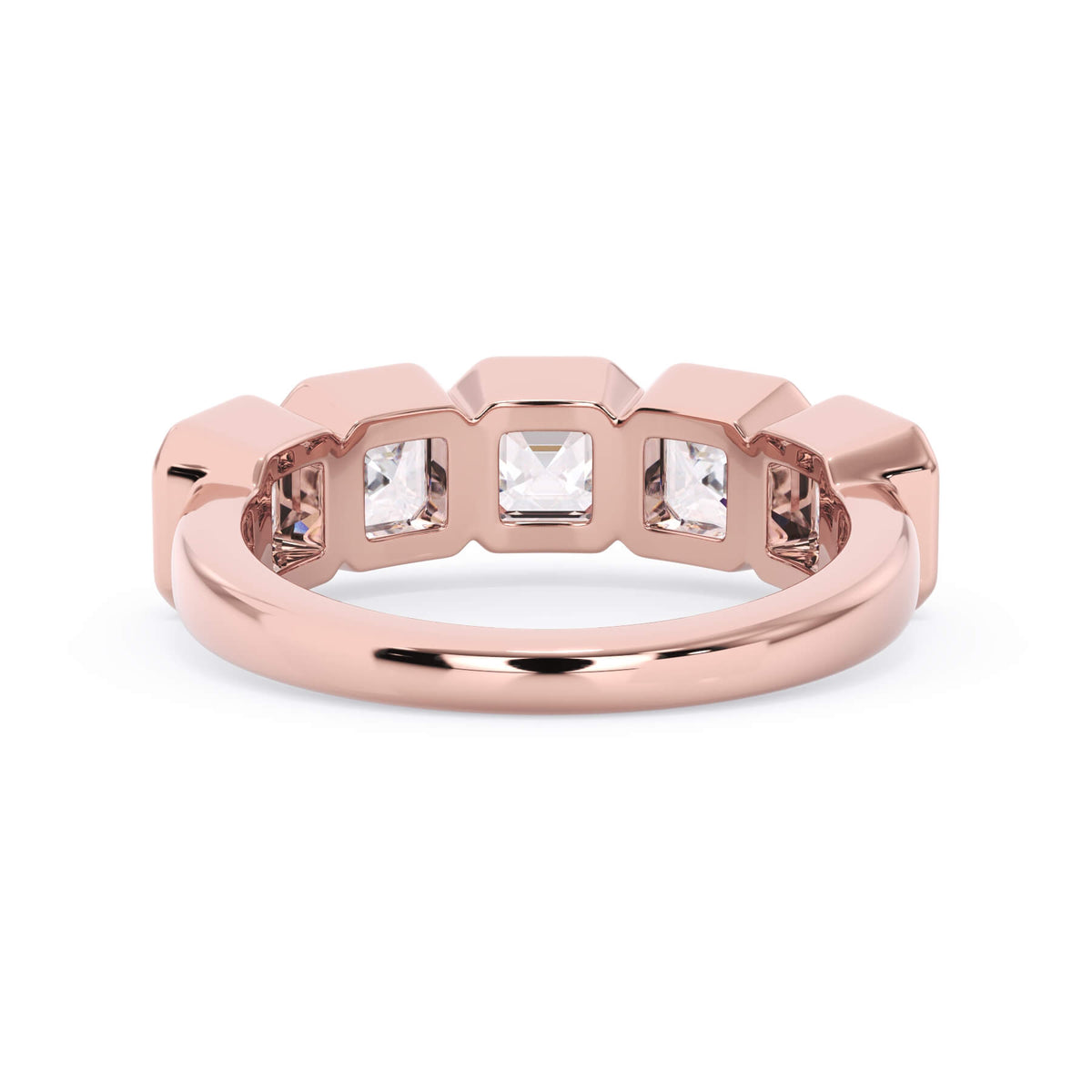 A picture of a five stone diamond wedding ring with asscher shape diamonds that are bezel set in rose gold on a white background with a view of the underside of the ring.