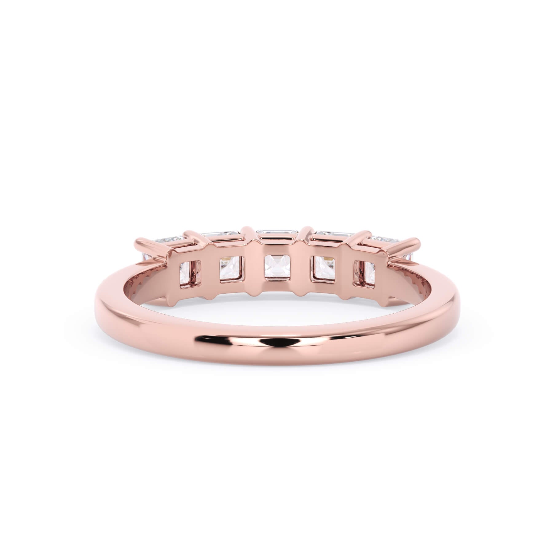 A picture of a five stone diamond wedding ring with asscher shape diamonds that are shared prong set in rose gold on a white background with a view of the underside of the ring.