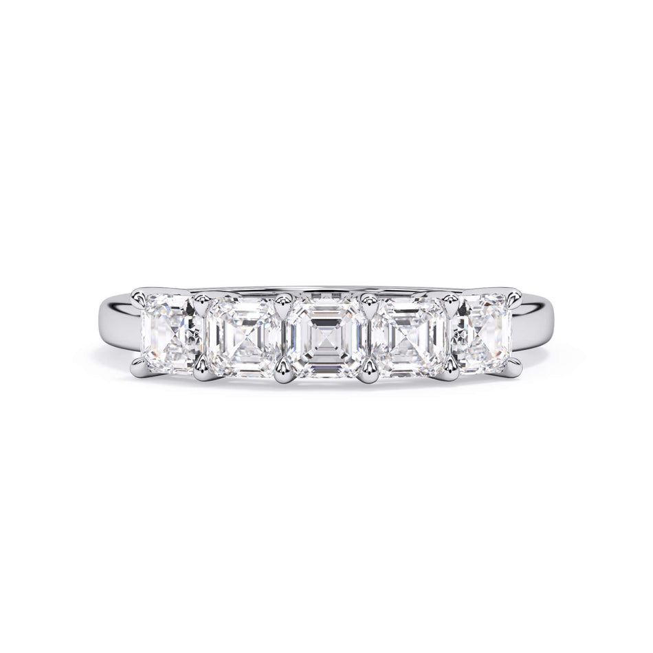 A picture of a five stone diamond wedding ring with asscher shape diamonds that are shared prong set in white gold or platinum on a white background with the ring facing forward, lying down.
