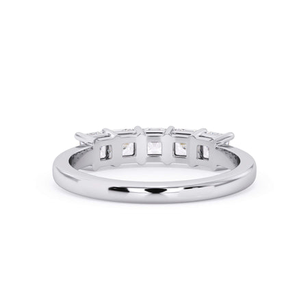 A picture of a five stone diamond wedding ring with asscher shape diamonds that are shared prong set in white gold or platinum on a white background with a view of the underside of the ring.