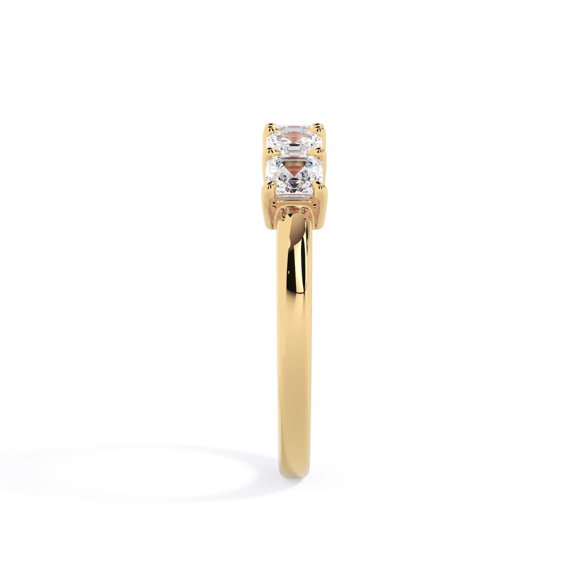 A picture of a five stone diamond wedding ring with asscher shape diamonds that are shared prong set in yellow gold on a white background with a side profile view.