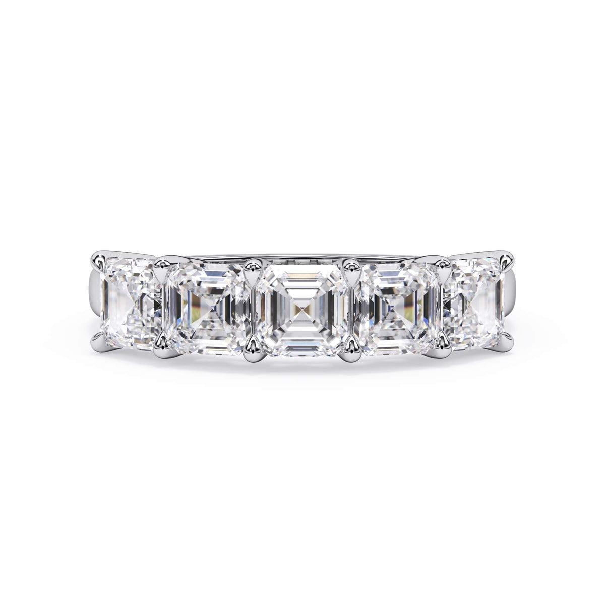 A picture of a five stone diamond wedding ring with asscher shape diamonds that are shared prong set in white gold or platinum on a white background with the ring facing forward, lying down.