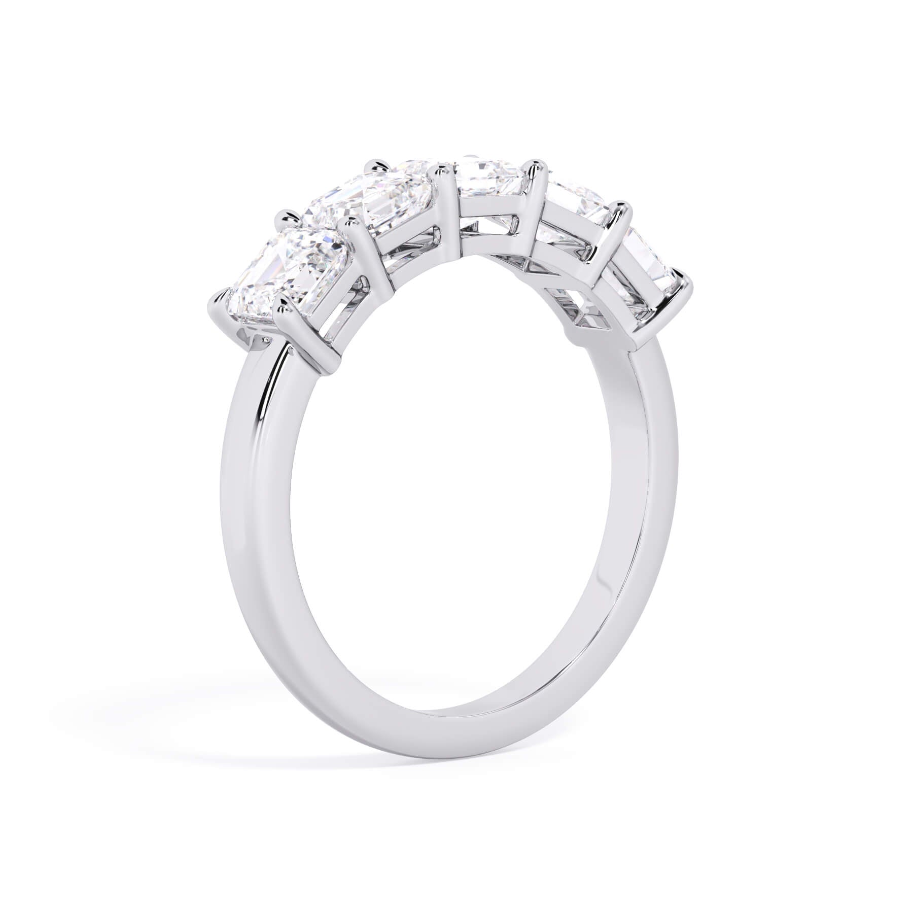 A picture of a five stone diamond wedding ring with asscher shape diamonds that are shared prong set in white gold or platinum on a white background with a slightly angled, through the finger view.