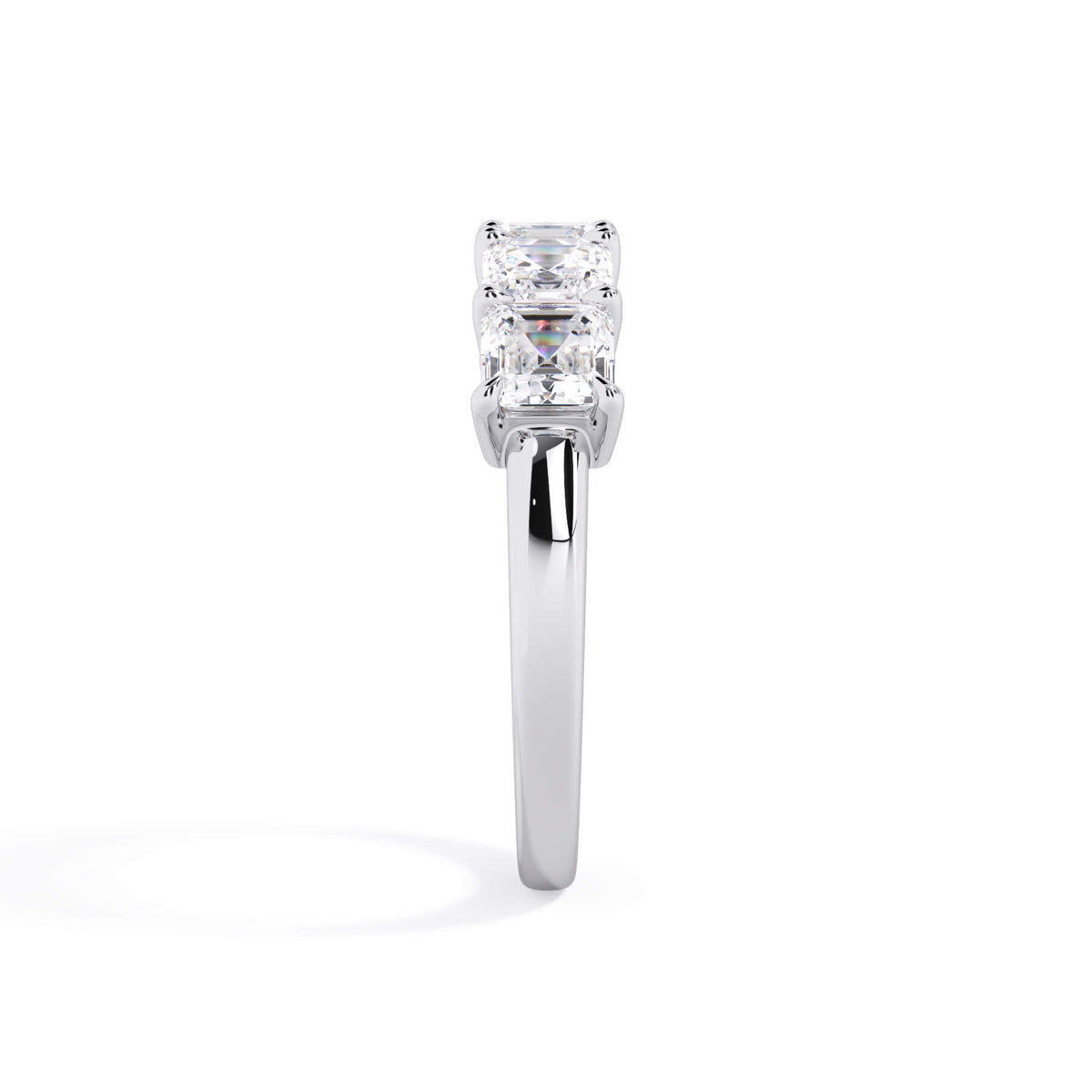A picture of a five stone diamond wedding ring with asscher shape diamonds that are shared prong set in white gold or platinum on a white background with a side profile view.