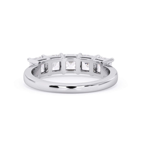 A picture of a five stone diamond wedding ring with asscher shape diamonds that are shared prong set in white gold or platinum on a white background with a view of the underside of the ring.