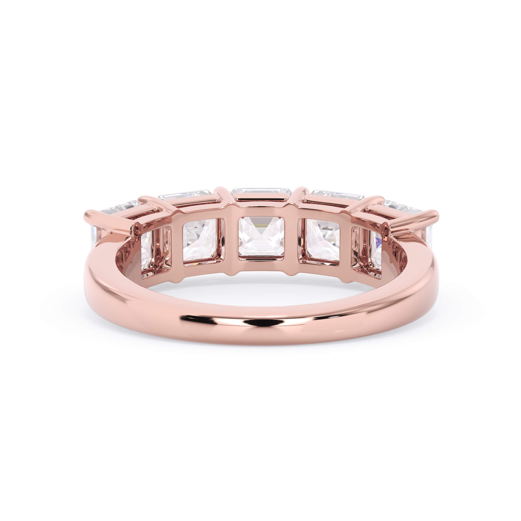 A picture of a five stone diamond wedding ring with asscher shape diamonds that are shared prong set in rose gold on a white background with a view of the underside of the ring.