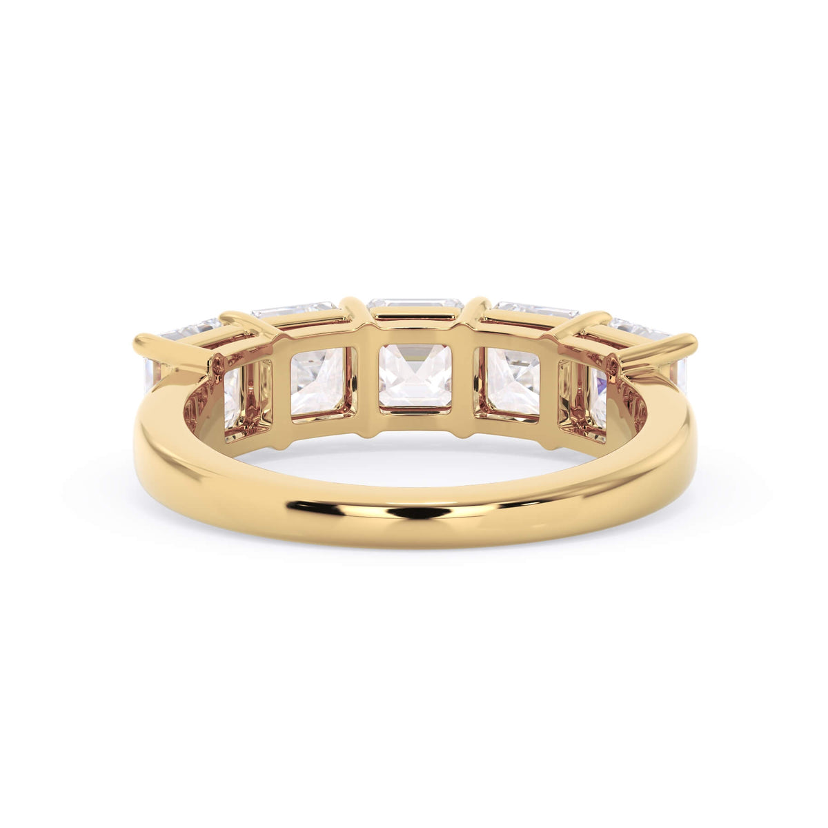 A picture of a five stone diamond wedding ring with asscher shape diamonds that are shared prong set in yellow gold on a white background with a view of the underside of the ring.