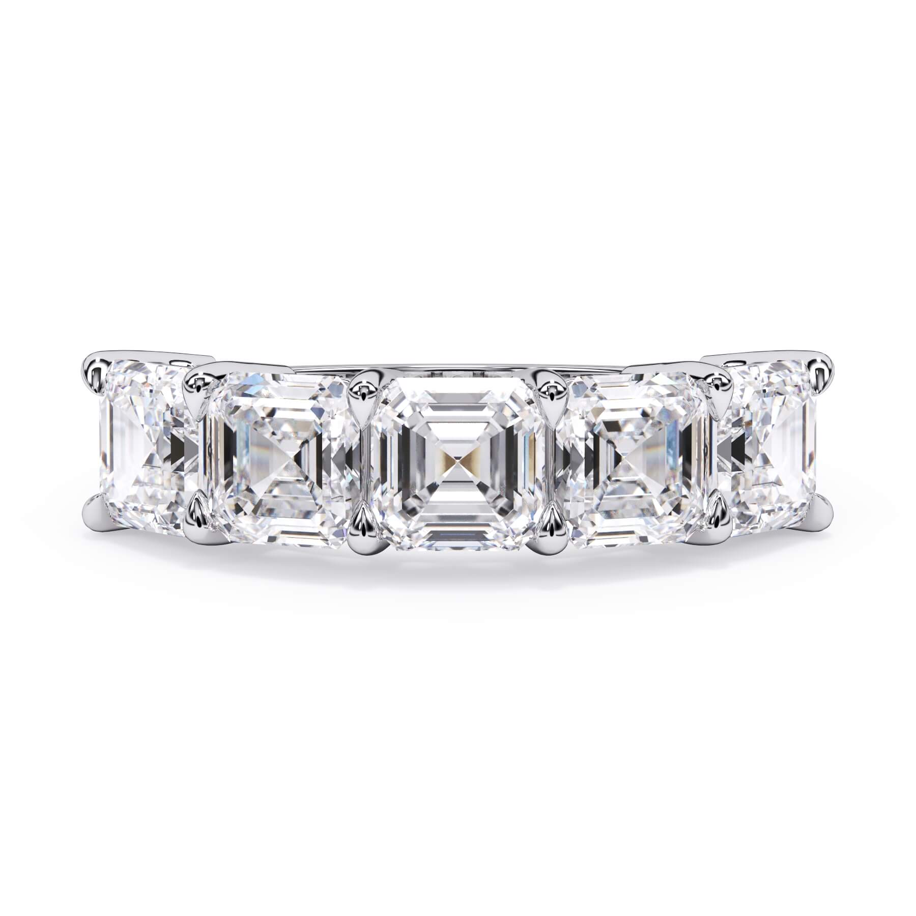 A picture of a five stone diamond wedding ring with asscher shape diamonds that are shared prong set in white gold or platinum on a white background with the ring facing forward, lying down.
