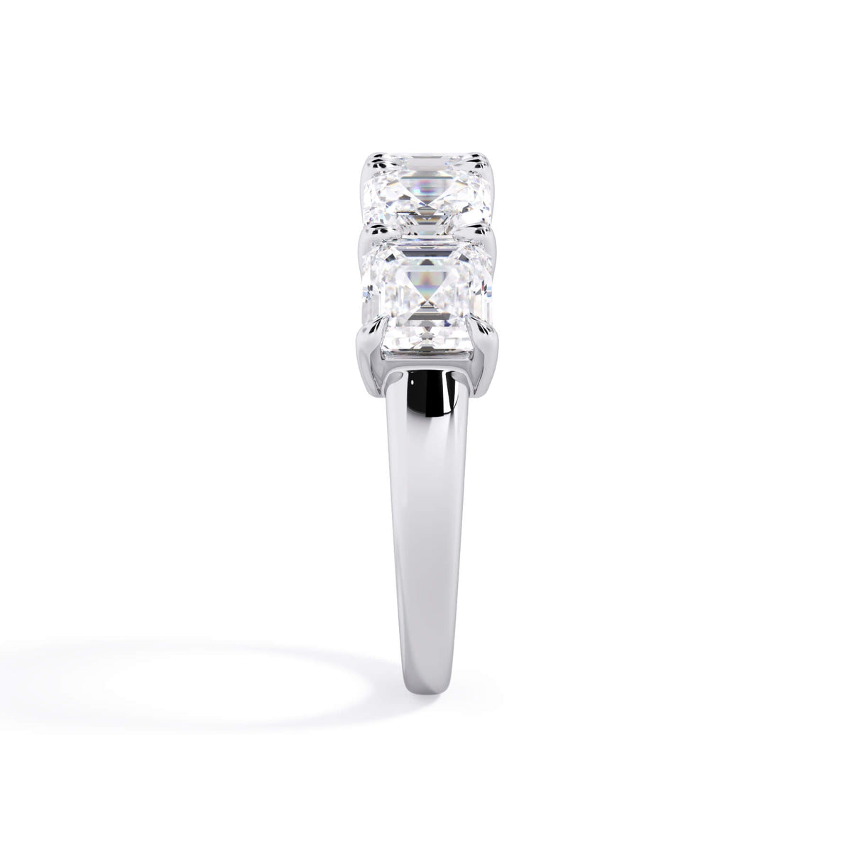 A picture of a five stone diamond wedding ring with asscher shape diamonds that are shared prong set in white gold or platinum on a white background with a side profile view.