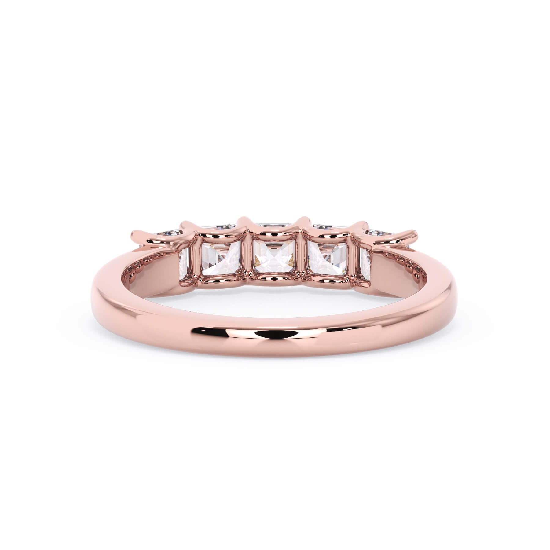 A picture of a five stone diamond wedding ring with asscher shape diamonds that are u prong set in rose gold on a white background with a view of the underside of the ring.