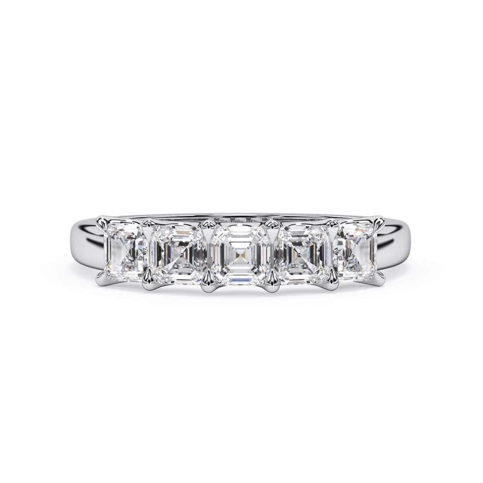 A picture of a five stone diamond wedding ring with asscher shape diamonds that are u prong set in white gold or platinum on a white background with the ring facing forward, lying down.