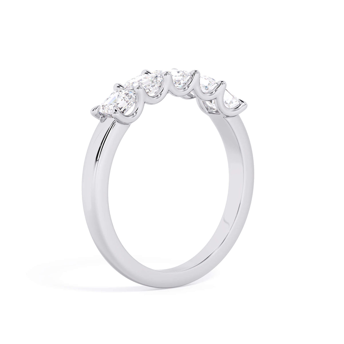 A picture of a five stone diamond wedding ring with asscher shape diamonds that are u prong set in white gold or platinum on a white background with a slightly angled, through the finger view.