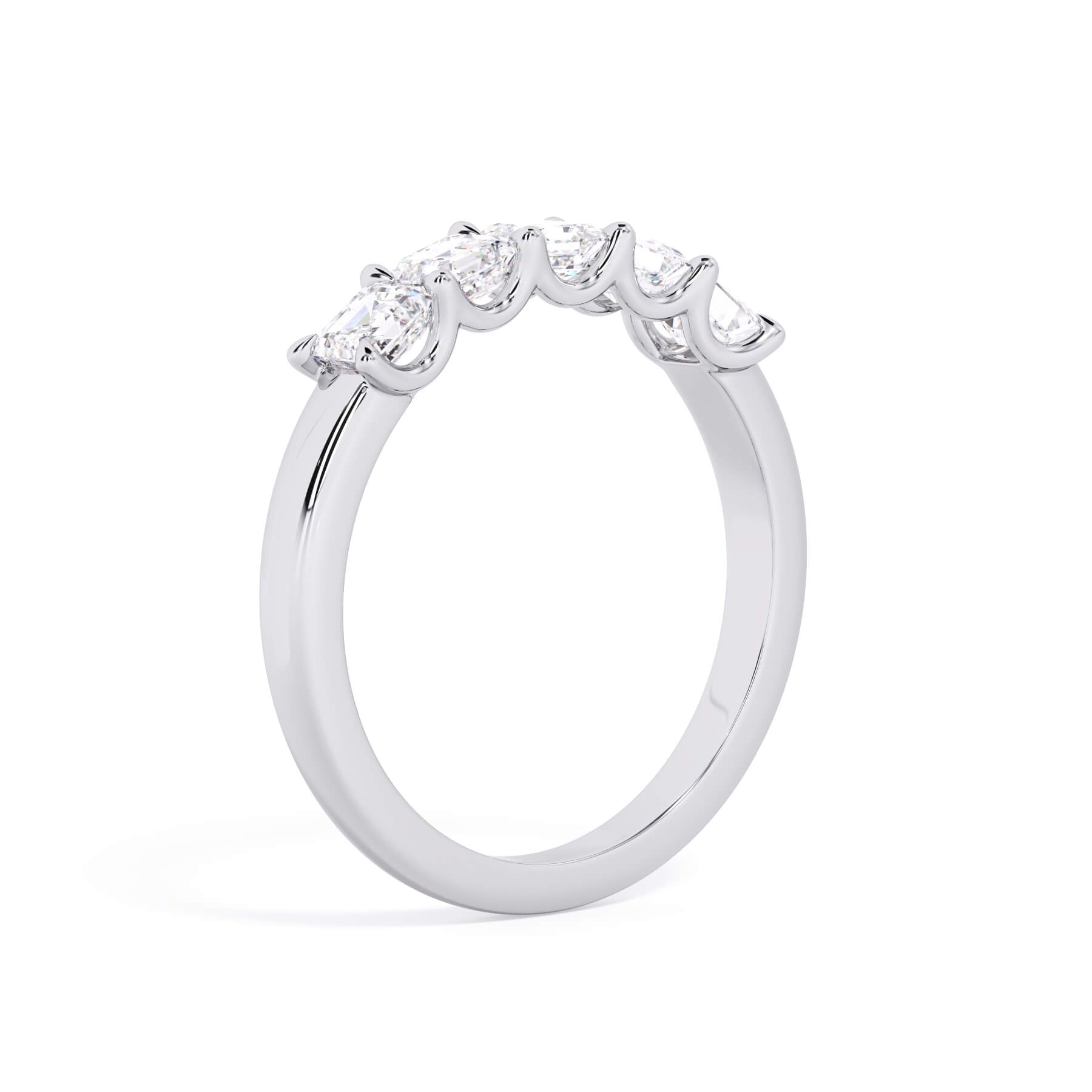 A picture of a five stone diamond wedding ring with asscher shape diamonds that are u prong set in white gold or platinum on a white background with a slightly angled, through the finger view.