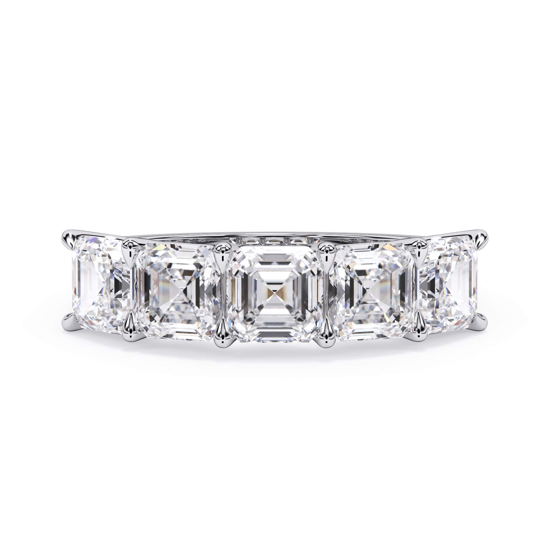 A picture of a five stone diamond wedding ring with asscher shape diamonds that are u prong set in white gold or platinum on a white background with the ring facing forward, lying down.