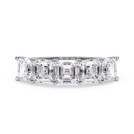 A picture of a five stone diamond wedding ring with asscher shape diamonds that are u prong set in white gold or platinum on a white background with the ring facing forward, lying down.