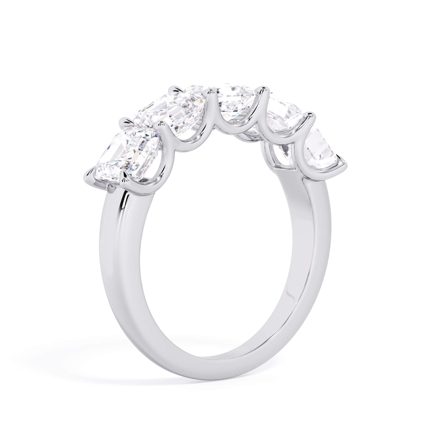 A picture of a five stone diamond wedding ring with asscher shape diamonds that are u prong set in white gold or platinum on a white background with a slightly angled, through the finger view.