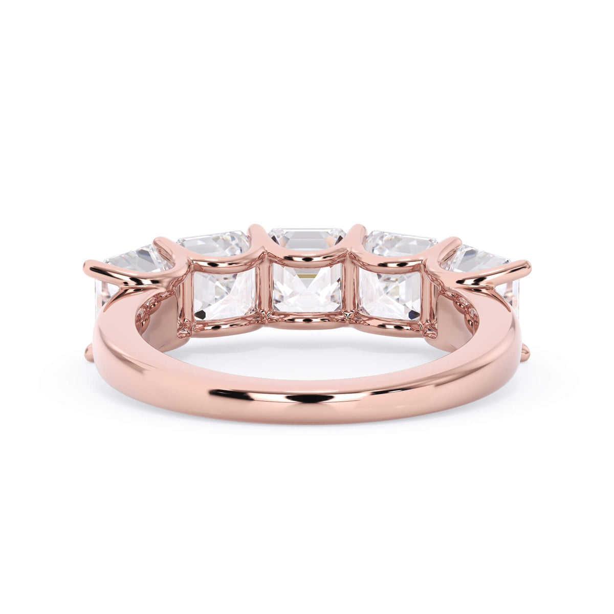 A picture of a five stone diamond wedding ring with asscher shape diamonds that are u prong set in rose gold on a white background with a view of the underside of the ring.