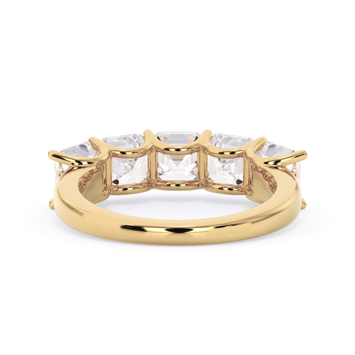 A picture of a five stone diamond wedding ring with asscher shape diamonds that are u prong set in yellow gold on a white background with a view of the underside of the ring.