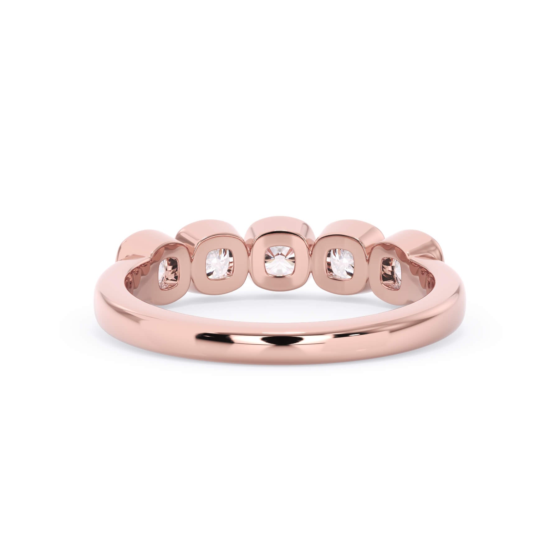 A picture of a five stone diamond wedding ring with cushion shape diamonds that are bezel set in rose gold on a white background with a view of the underside of the ring.