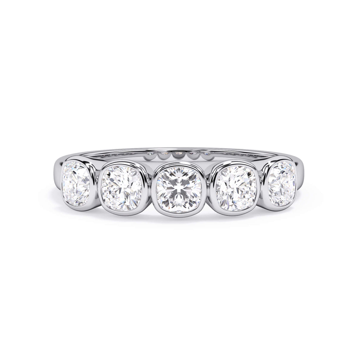 A picture of a five stone diamond wedding ring with cushion shape diamonds that are bezel set in white gold or platinum on a white background with the ring facing forward, lying down.