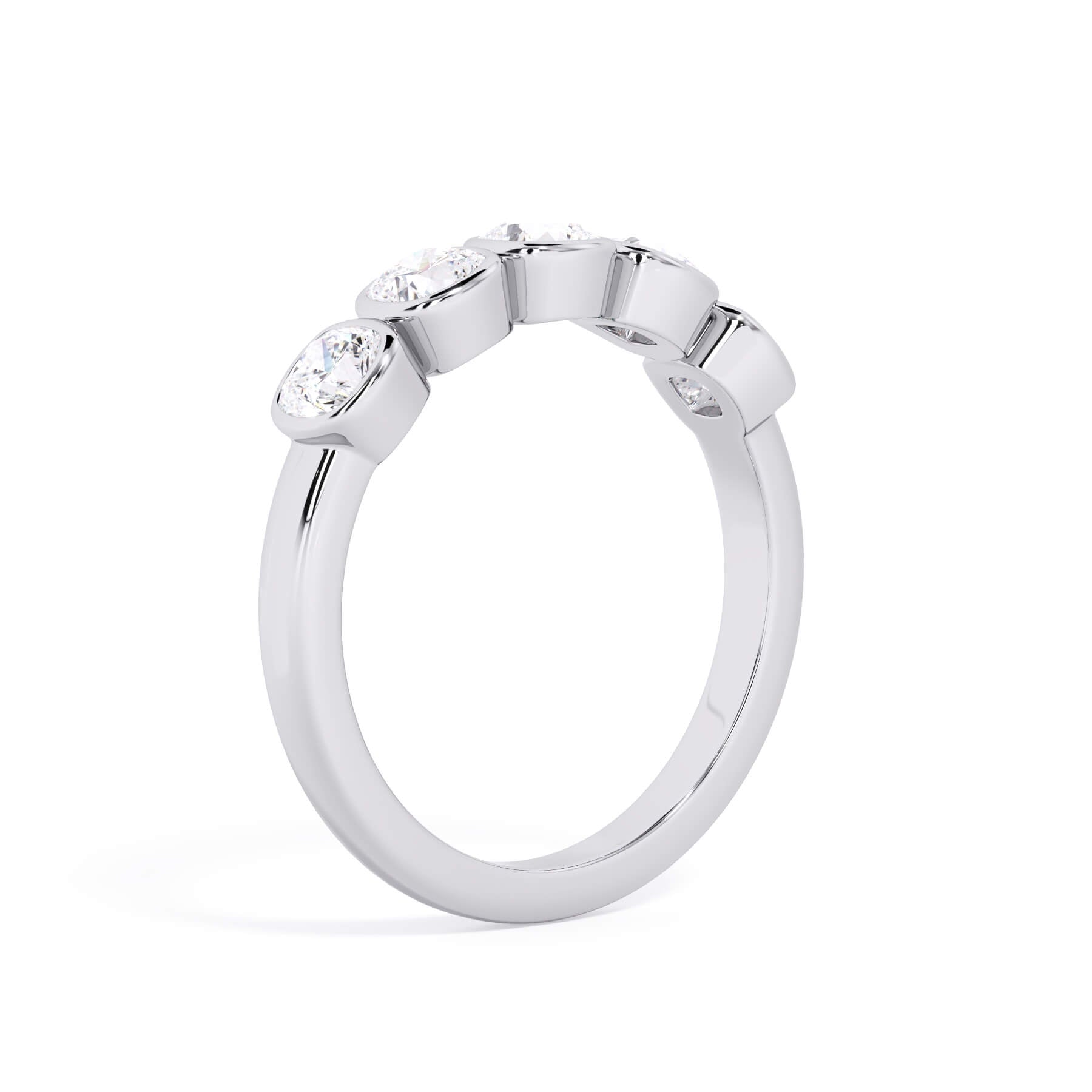 A picture of a five stone diamond wedding ring with cushion shape diamonds that are bezel set in white gold or platinum on a white background with a slightly angled, through the finger view.