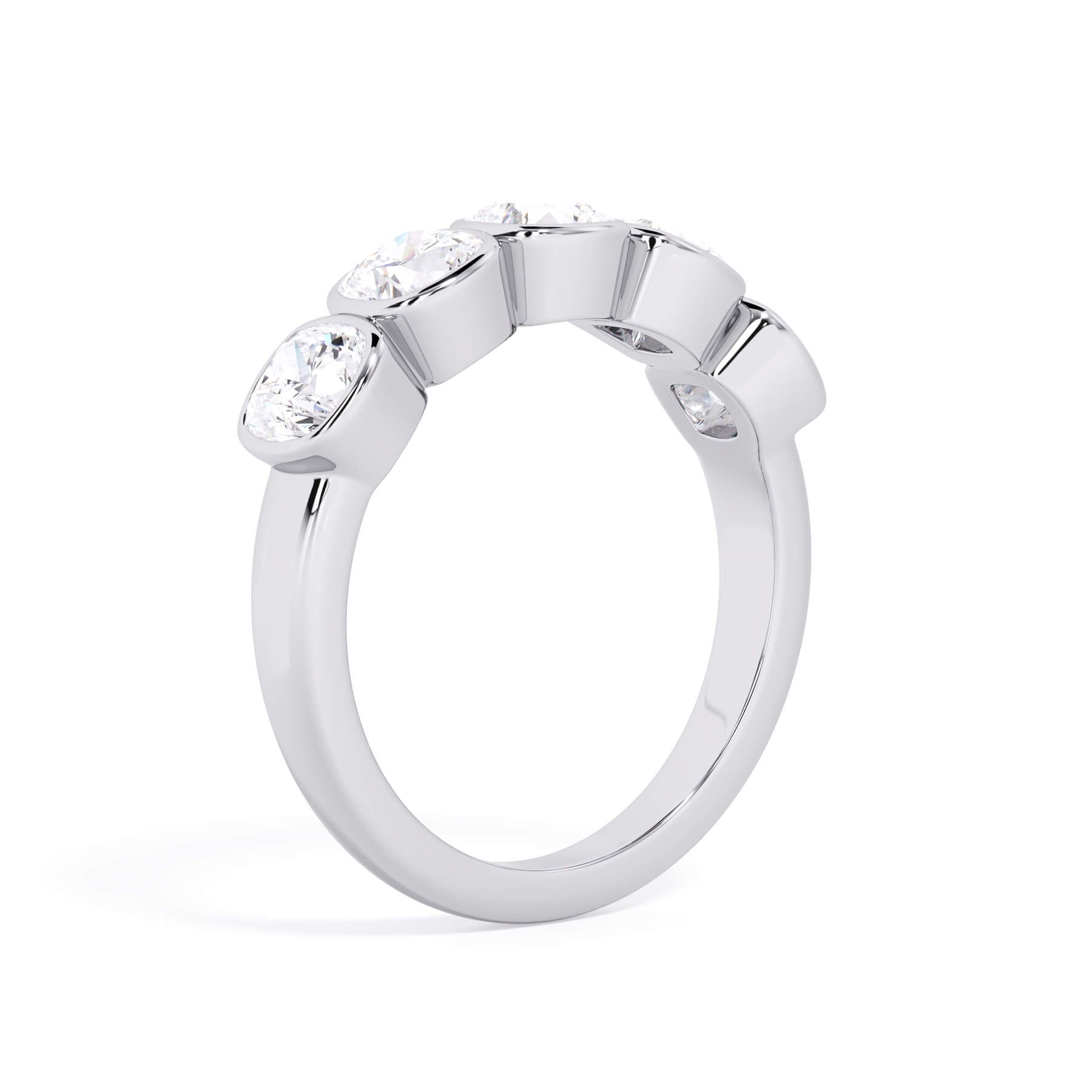 A picture of a five stone diamond wedding ring with cushion shape diamonds that are bezel set in white gold or platinum on a white background with a slightly angled, through the finger view.