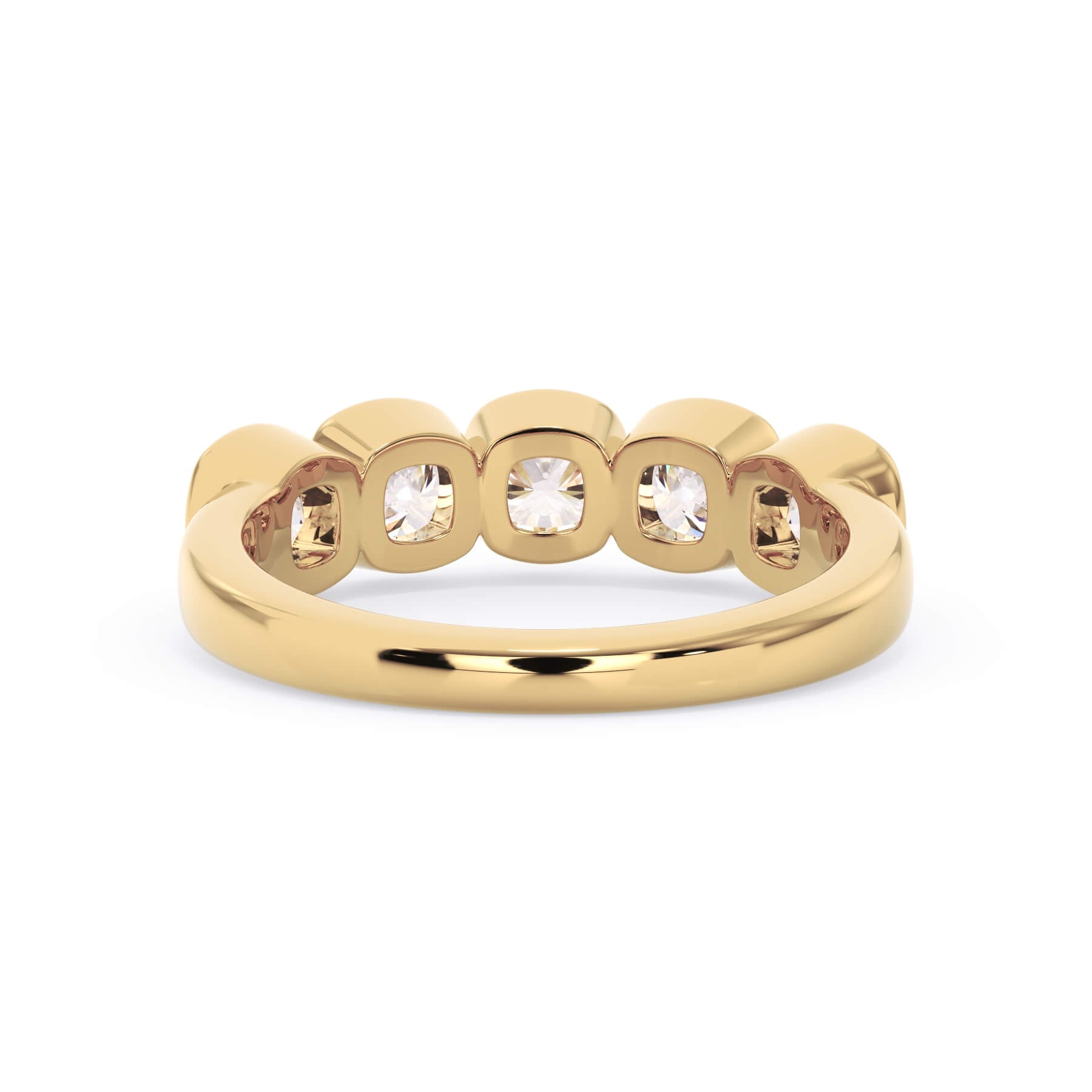 A picture of a five stone diamond wedding ring with cushion shape diamonds that are bezel set in yellow gold on a white background with a view of the underside of the ring.