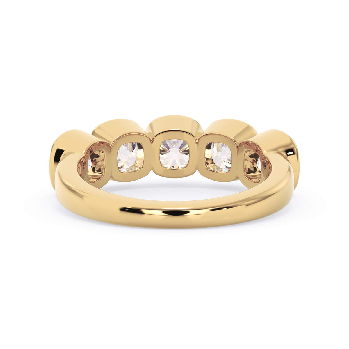 A picture of a five stone diamond wedding ring with cushion shape diamonds that are bezel set in yellow gold on a white background with a view of the underside of the ring.