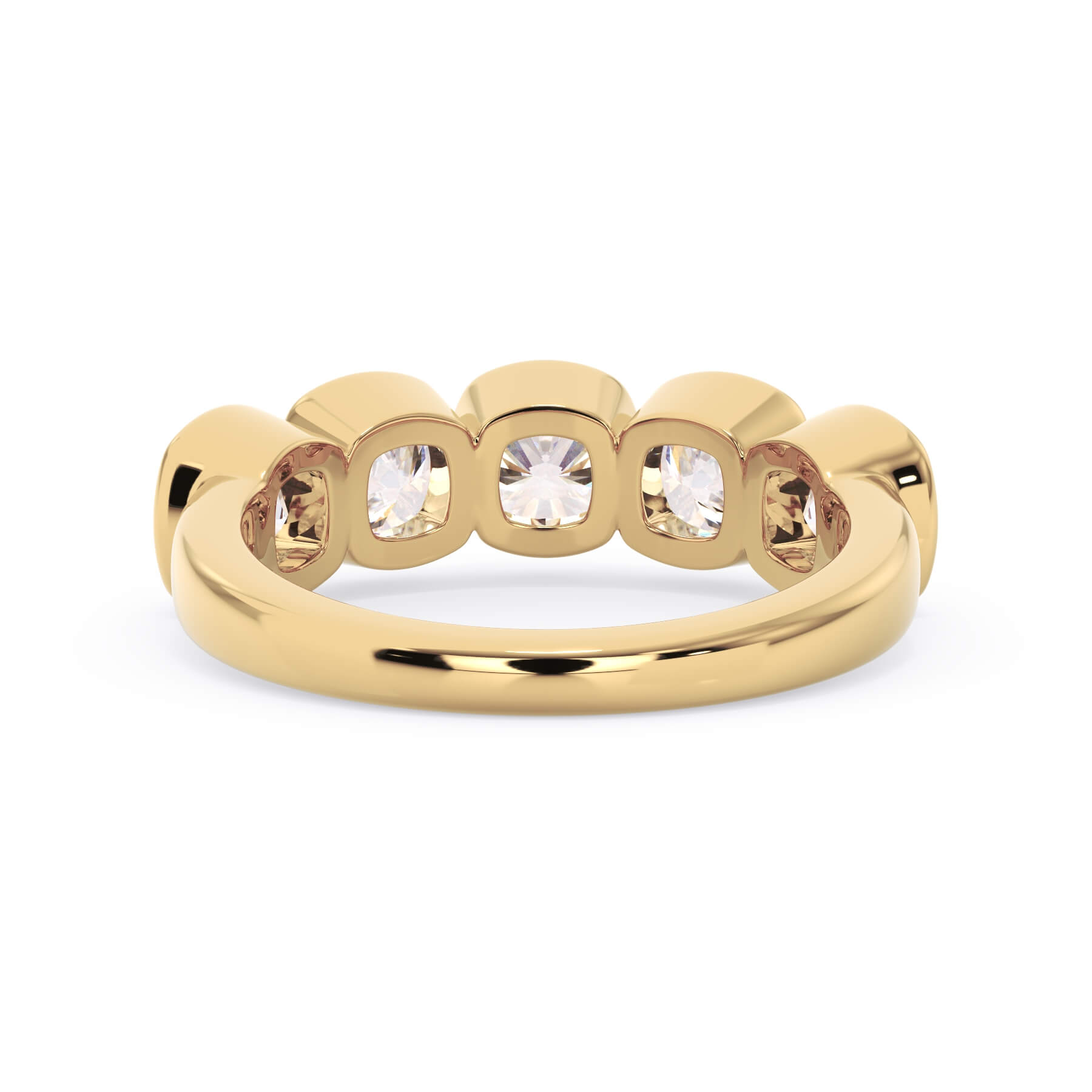 A picture of a five stone diamond wedding ring with cushion shape diamonds that are bezel set in yellow gold on a white background with a view of the underside of the ring.