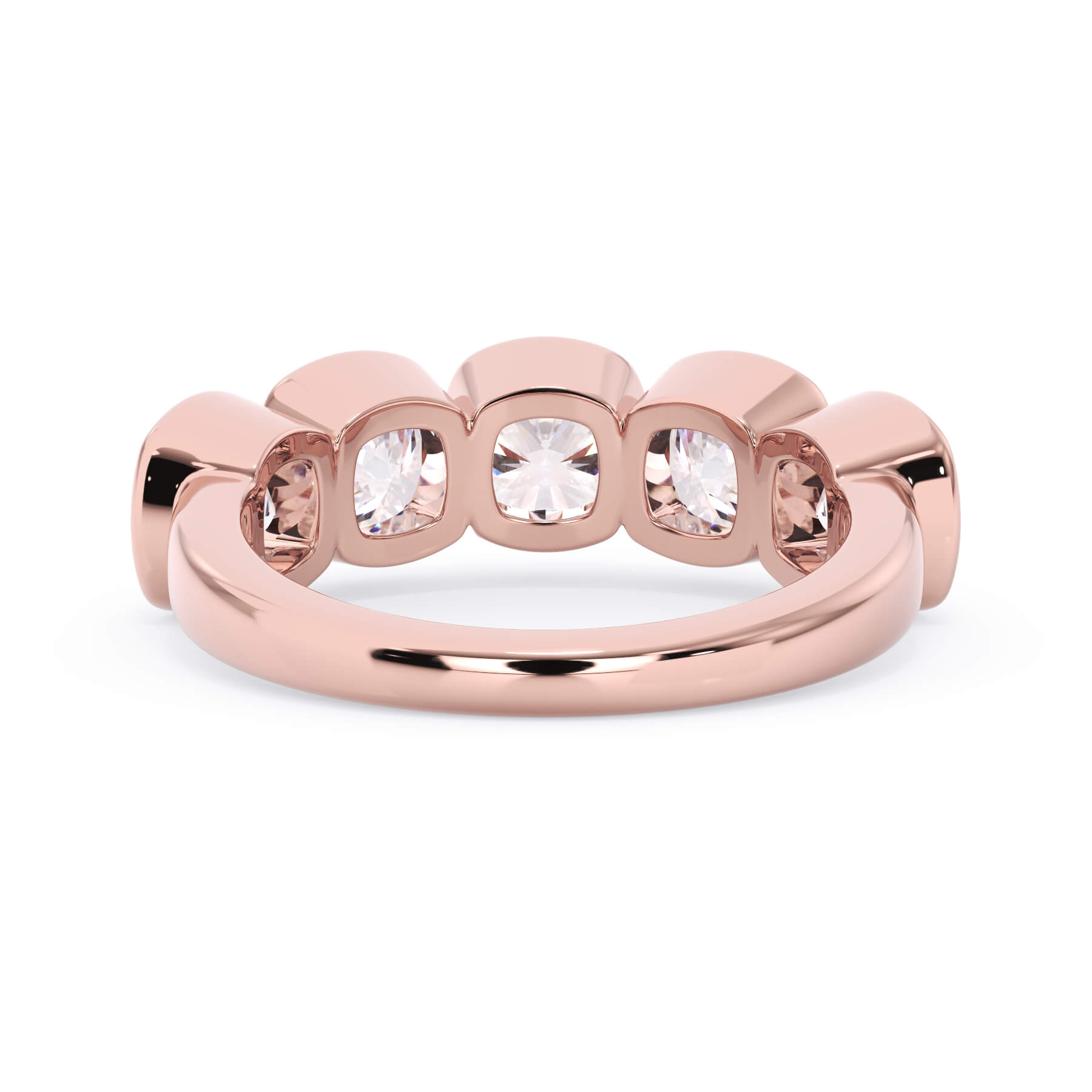 A picture of a five stone diamond wedding ring with cushion shape diamonds that are bezel set in rose gold on a white background with a view of the underside of the ring.
