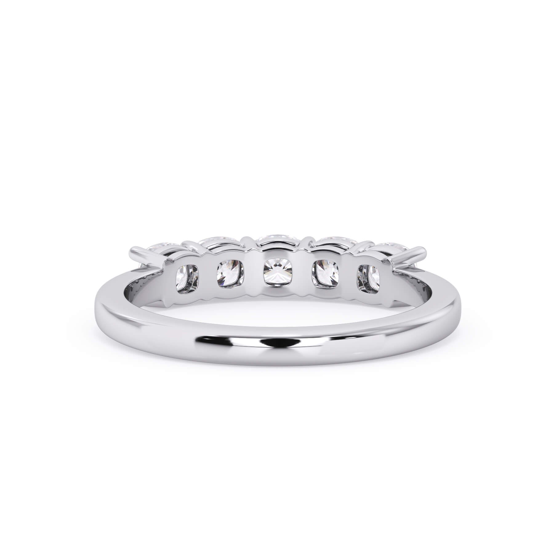 A picture of a five stone diamond wedding ring with cushion shape diamonds that are shared prong set in white gold or platinum on a white background with a view of the underside of the ring.