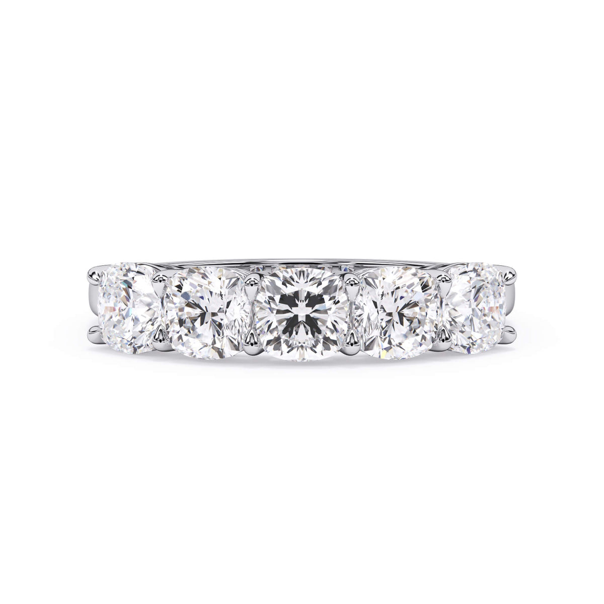 A picture of a five stone diamond wedding ring with cushion shape diamonds that are shared prong set in white gold or platinum on a white background with the ring facing forward, lying down.