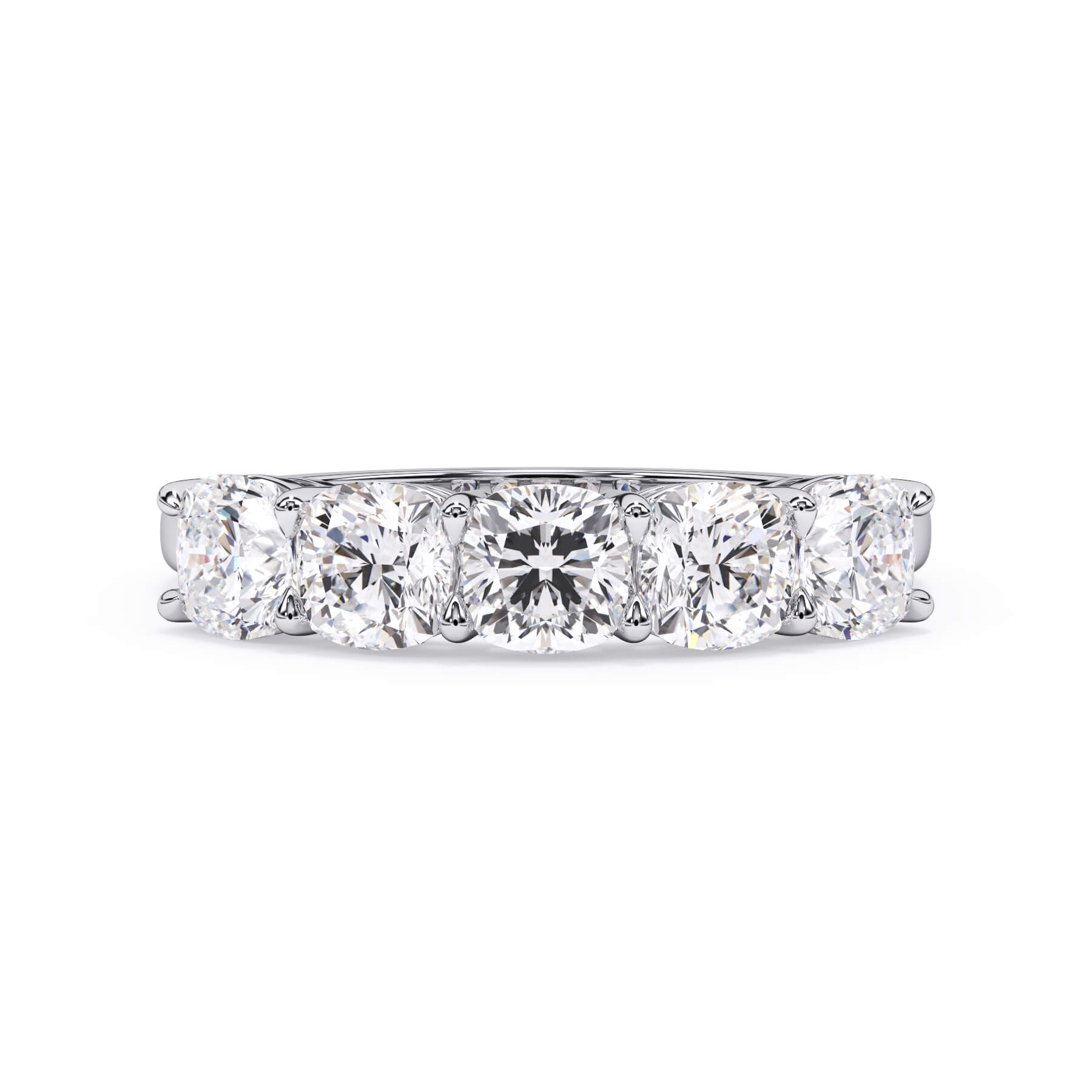 A picture of a five stone diamond wedding ring with cushion shape diamonds that are shared prong set in white gold or platinum on a white background with the ring facing forward, lying down.