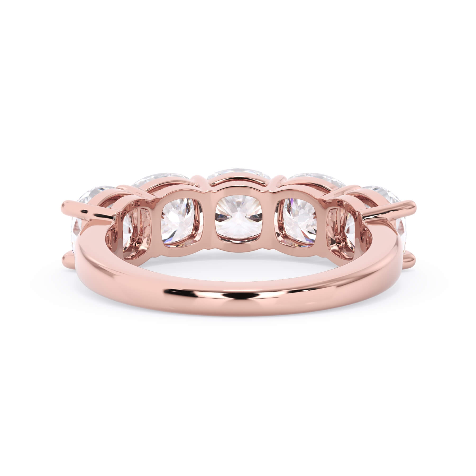 A picture of a five stone diamond wedding ring with cushion shape diamonds that are shared prong set in rose gold on a white background with a view of the underside of the ring.