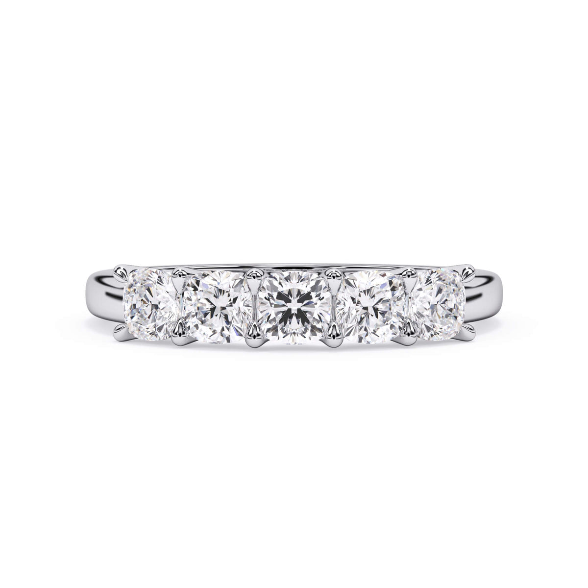 A picture of a five stone diamond wedding ring with cushion shape diamonds that are u prong set in white gold or platinum on a white background with the ring facing forward, lying down.