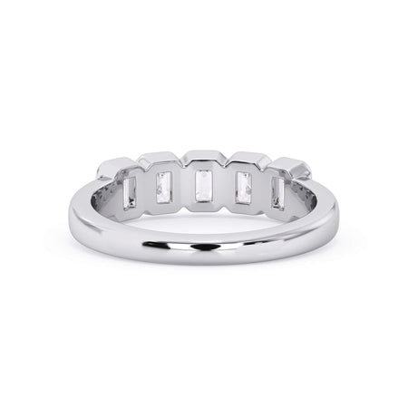 A picture of a five stone diamond wedding ring with emerald cut diamonds that are bezel set in white gold or platinum on a white background with a view of the underside of the ring.