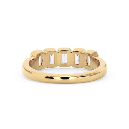 A picture of a five stone diamond wedding ring with emerald cut diamonds that are bezel set in yellow gold on a white background with a view of the underside of the ring.