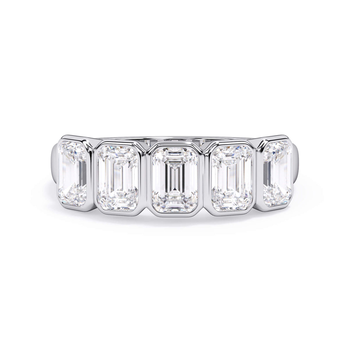 A picture of a five stone diamond wedding ring with emerald cut diamonds that are bezel set in white gold or platinum on a white background with the ring facing forward, lying down.