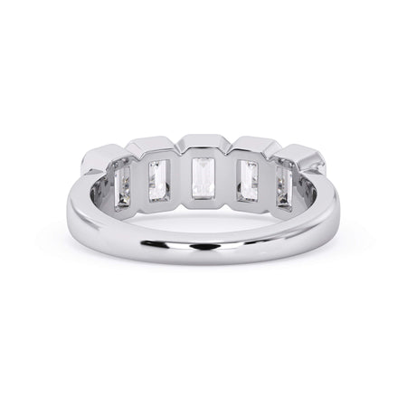 A picture of a five stone diamond wedding ring with emerald cut diamonds that are bezel set in white gold or platinum on a white background with a view of the underside of the ring.