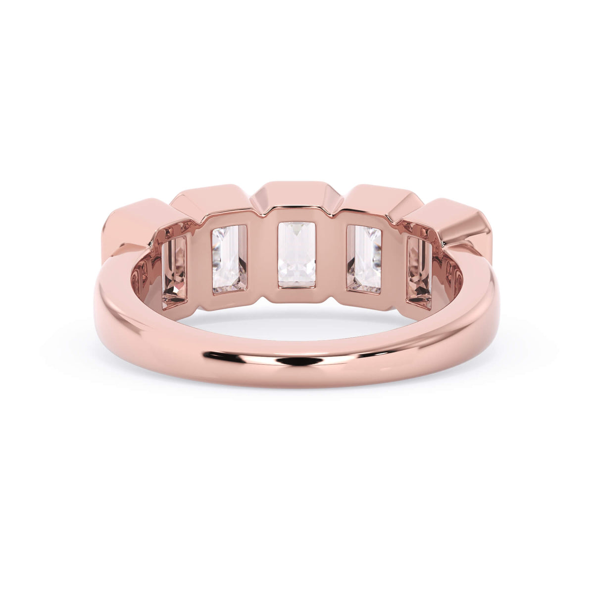 A picture of a five stone diamond wedding ring with emerald cut diamonds that are bezel set in rose gold on a white background with a view of the underside of the ring.