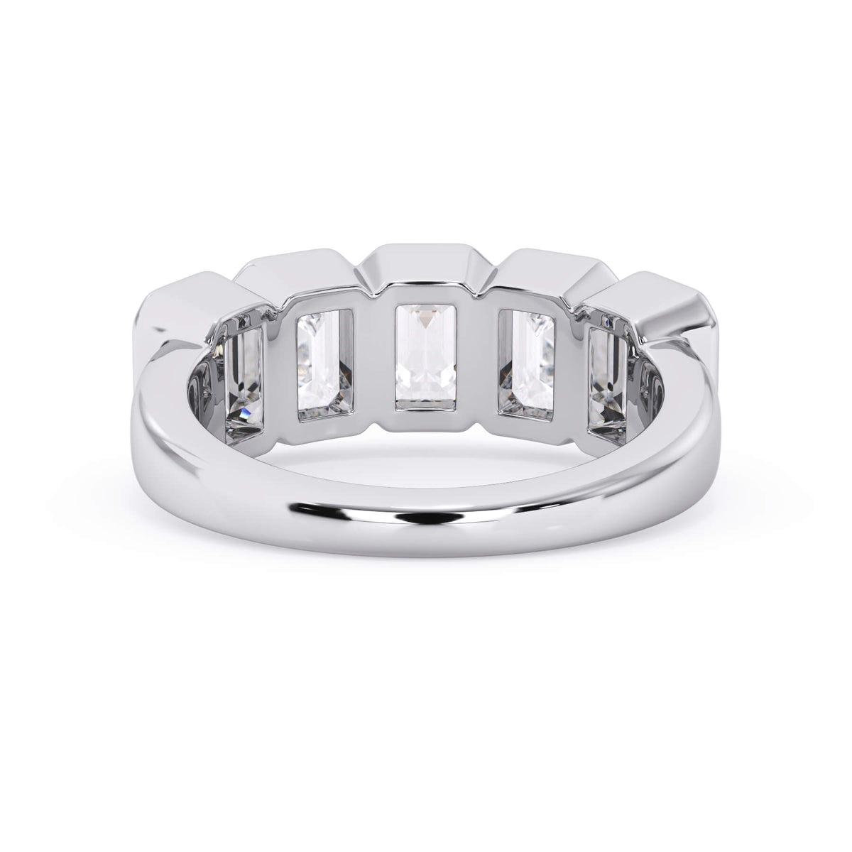 A picture of a five stone diamond wedding ring with emerald cut diamonds that are bezel set in white gold or platinum on a white background with a view of the underside of the ring.