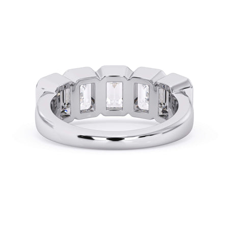 A picture of a five stone diamond wedding ring with emerald cut diamonds that are bezel set in white gold or platinum on a white background with a view of the underside of the ring.