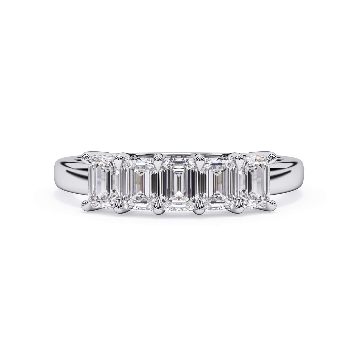 A picture of a five stone diamond wedding ring with emerald cut diamonds that are shared prong set in white gold or platinum on a white background with the ring facing forward, lying down.