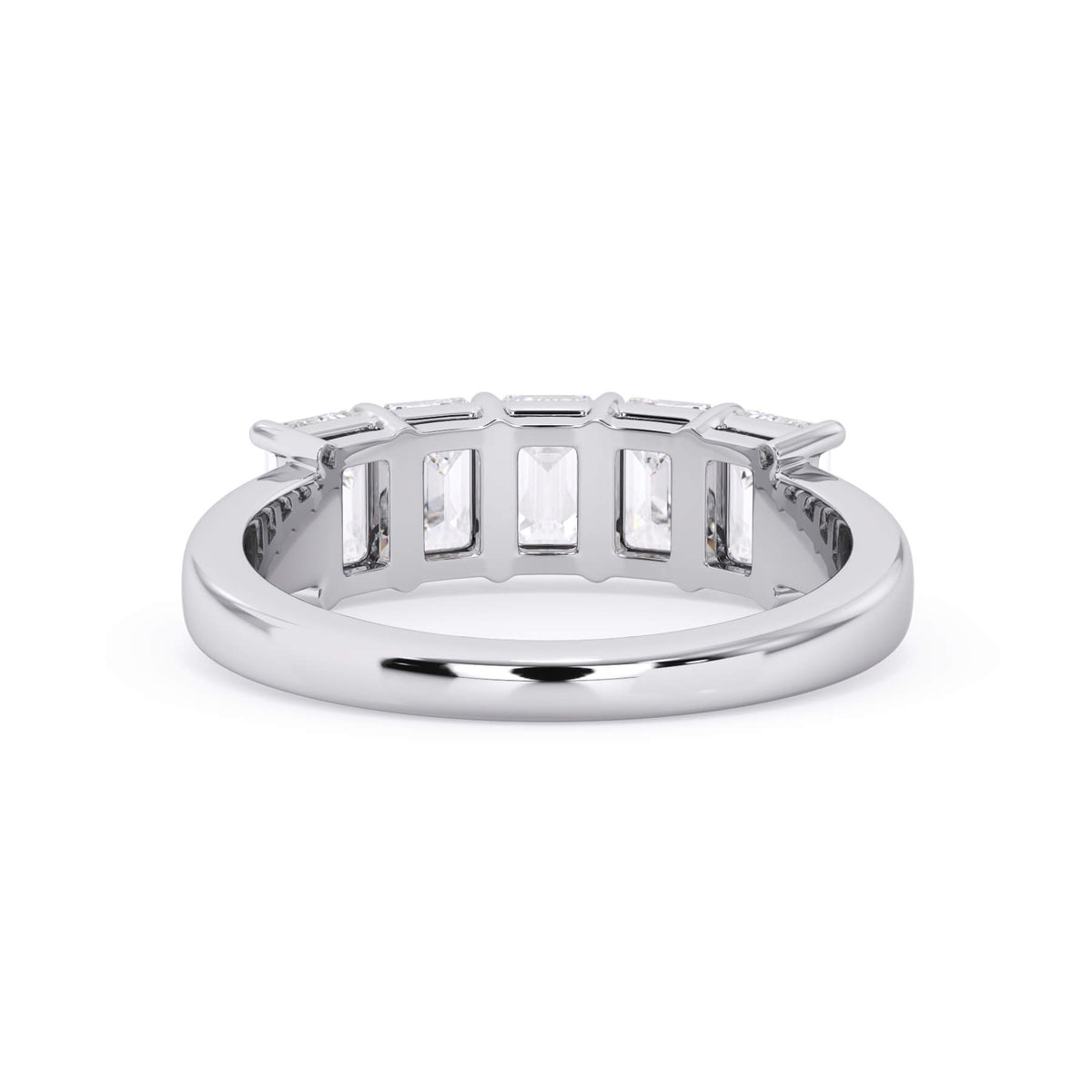 A picture of a five stone diamond wedding ring with emerald cut diamonds that are shared prong set in white gold or platinum on a white background with a view of the underside of the ring.