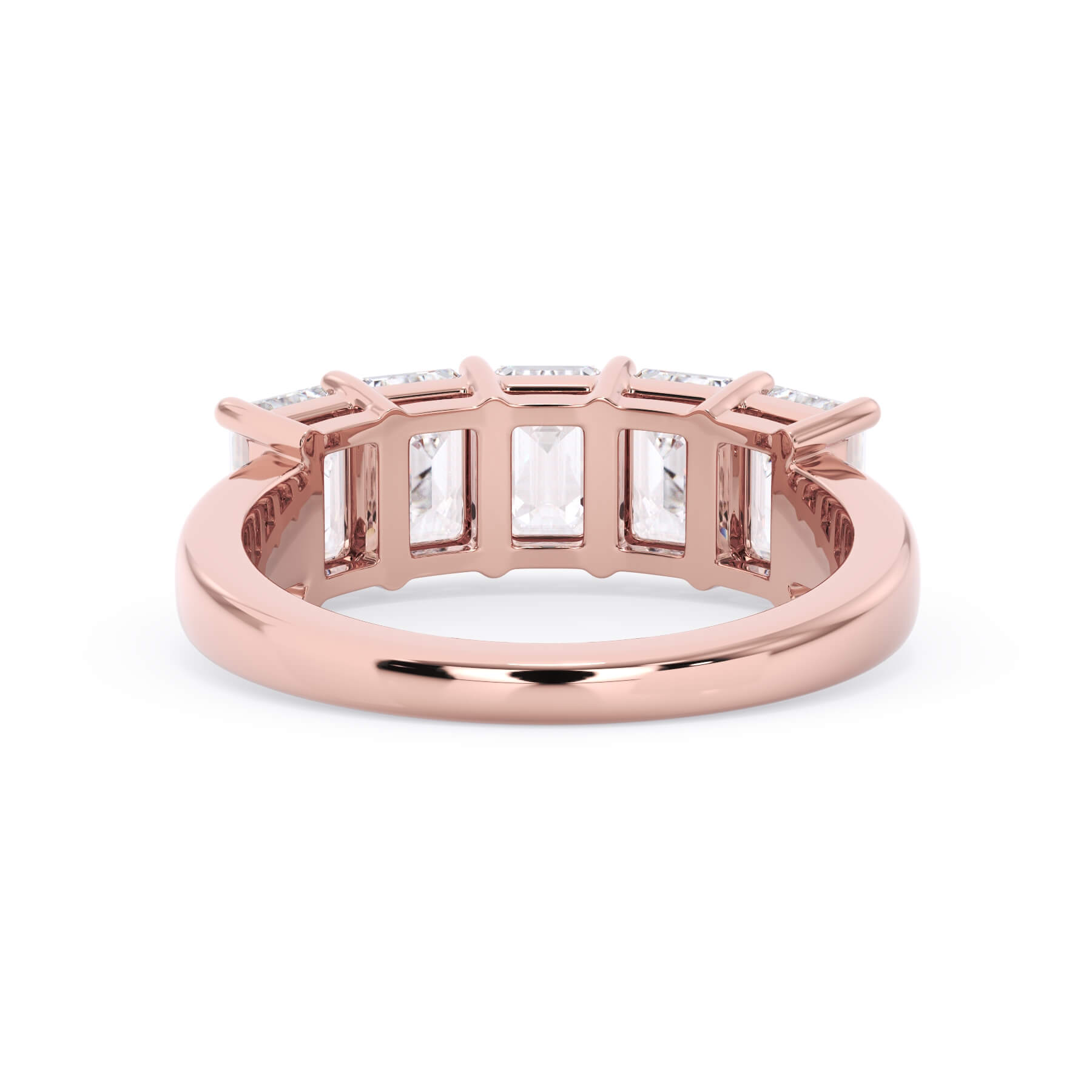 A picture of a five stone diamond wedding ring with emerald cut diamonds that are shared prong set in rose gold on a white background with a view of the underside of the ring.
