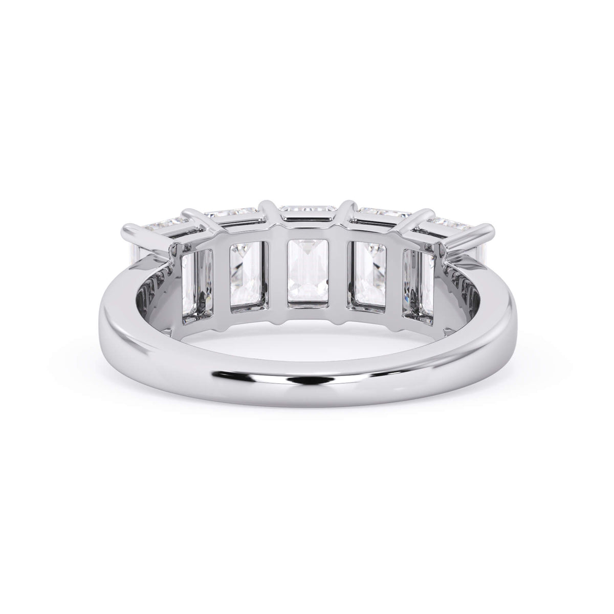 A picture of a five stone diamond wedding ring with emerald cut diamonds that are shared prong set in white gold or platinum on a white background with a view of the underside of the ring.