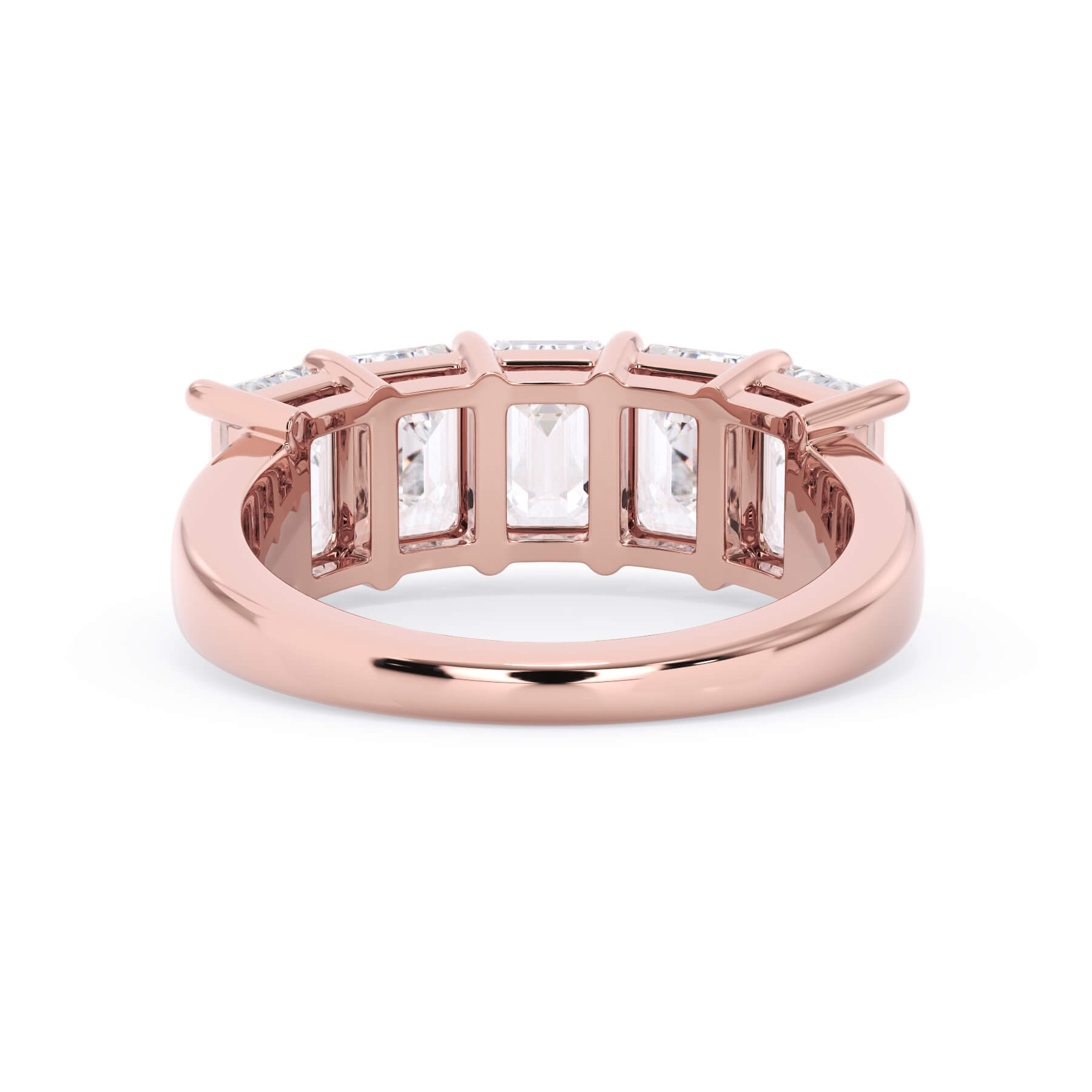A picture of a five stone diamond wedding ring with emerald cut diamonds that are shared prong set in rose gold on a white background with a view of the underside of the ring.